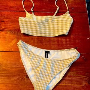 Brand new Triangl bikini. Worn once. Super cute gold sparkle gingham.